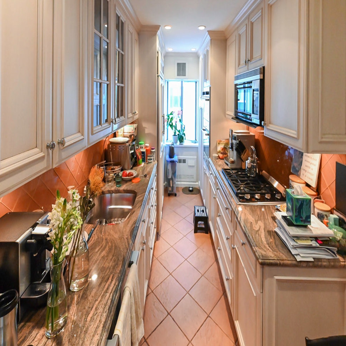 Wood-Mode Wonder: Traditional Light Cream Kitchen with Granite Countertops