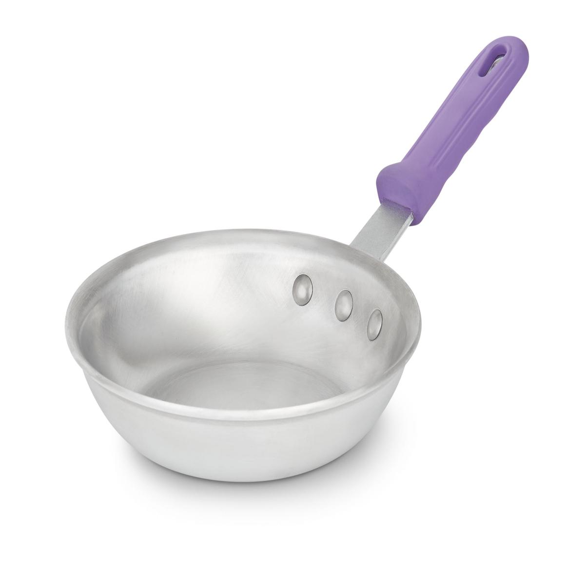 7-inch Wear-Ever fry pan with natural finish and purple silicone handle